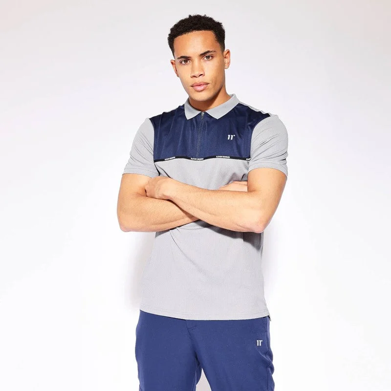 Men's stretchable athletic polo shirts for fitness workoutsTaped Zip Polo - Golf Grey / True Navy